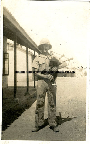 Albert Marshall playing the pipes